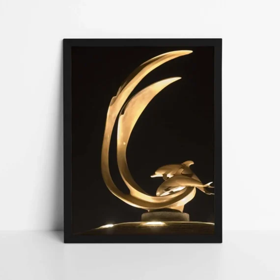 Sculpture of Dolphins at Night Poster