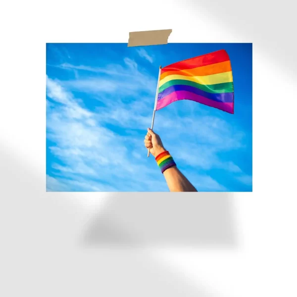 Colorful backlit rainbow gay pride flag being waved in the breeze against a sunset sky Poster