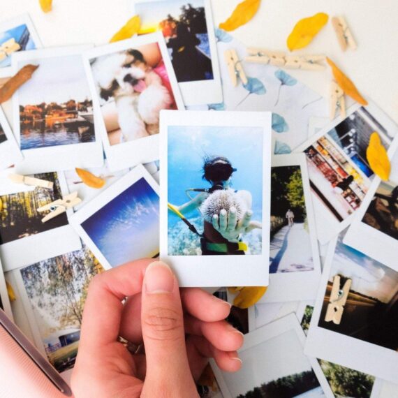 A bunch of polaroid pictures sitting on top of a table photo – Free Collage  Image on Unsplash